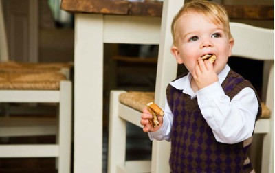 toddler-boy-eating-biscuit